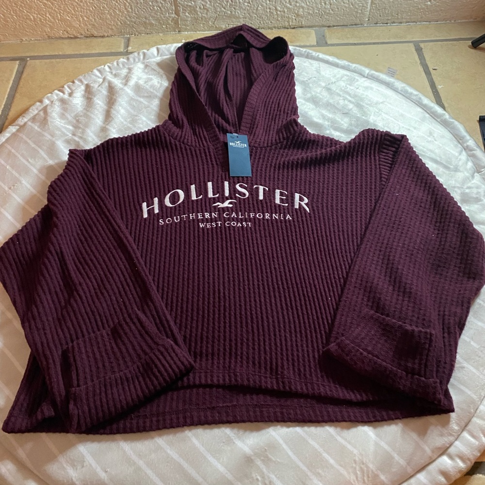 Burgundy hollister light crop top sweater or pull over.